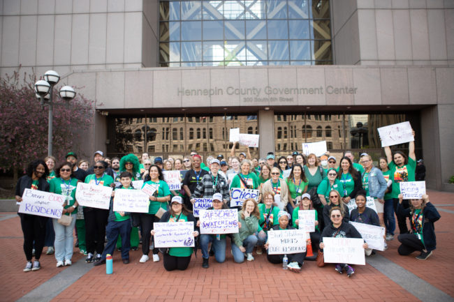 Hennepin County AFSCME 34 and 2822 members pose for a group photo in front of the Hennepin County Government Center. (H. Jiahong Pan for AFSCME Local 34)